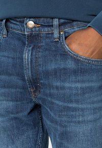 Lee RIDER - Calças de ganga justas - dark blue denim