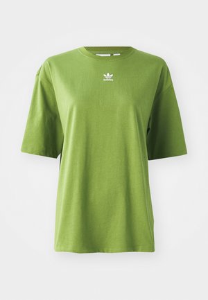 Green cotton t-shirt with short sleeves, round neckline, and white Adidas logo on the chest. Smooth texture, relaxed fit.