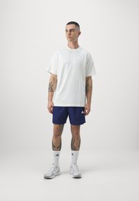 adidas Sportswear ALL SZN GRAPHIC - Základné tričko - off white