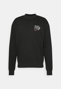 Felpa nera in cotone, con colletto rotondo, maniche lunghe e una grafica frontale in bianco e rosso con il testo "HUGO".