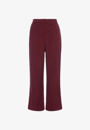Pantaloni larghi color bordeaux realizzati in tessuto morbido, con vita alta e una texture liscia senza decorazioni visibili.