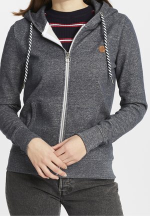 Grijze zip-up hoodie met een gestructureerde stof, witte stropdrawstrings en een logo patch. Beschikt over vo pockets en geribbelde manchetten.