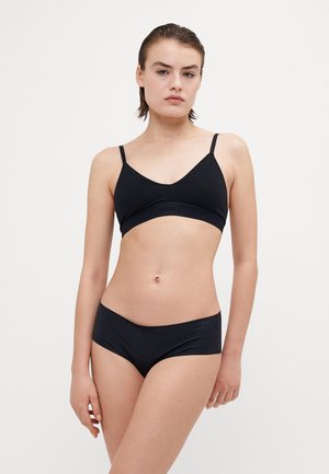 Black underwear set featuring a sleek, minimalist design with a soft fabric texture. Includes a bralette and matching hipster briefs.