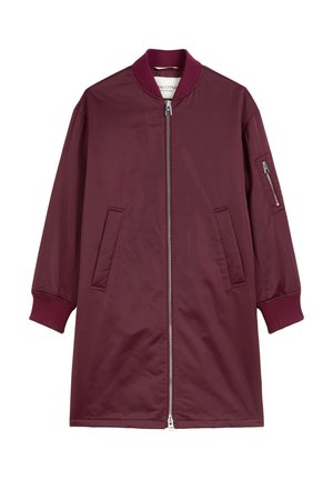 Burgundy bomber jacket with a zip front, ribbed cuffs, two side pockets, and an additional zip pocket on the sleeve. Smooth fabric texture.