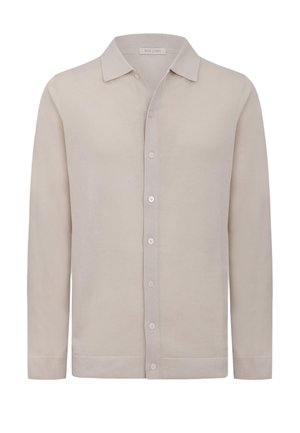 Jasnobeżowa koszula na długi rękaw z kołnierzykiem, zapinana na siedem przednich guzików, z prostym dołem.