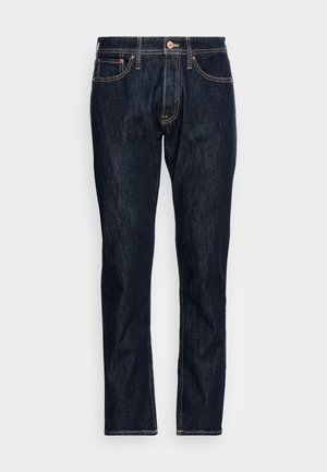 Mörkblå denimjeans med rak passform. Funktioner inkluderar två framfickor, knäppning med knapp och kontrasterande orange sömmar.