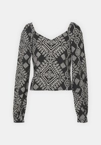 Svart cropped topp med lange ermer, med et geometrisk hvitt mønster, teksturert stoff og firkantet utringning.