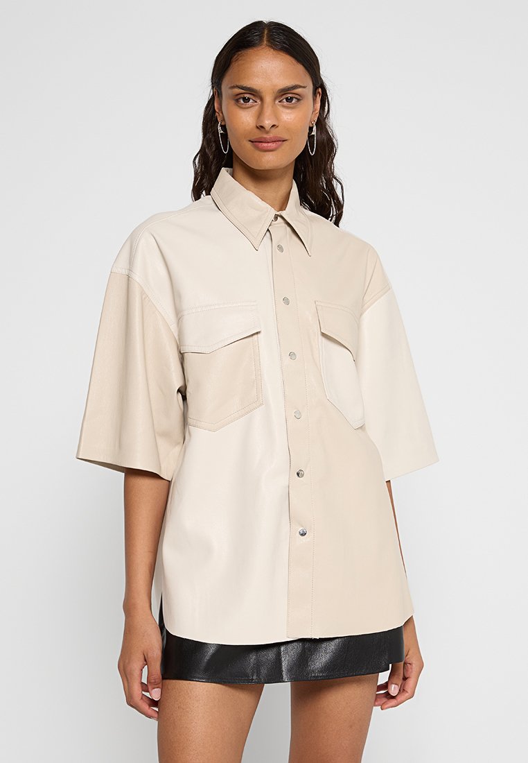 Nanushka Overhemdblouse beige Nanushka Overhemdblouse beige