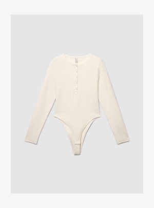 Long-sleeve, cream bodysuit in soft fabric featuring a rounded neckline and a button placket at the front. Brief cut at the bottom.