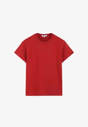 Punainen lyhythihainen pyöreäkauluksinen puuvillainen T-paita, jossa vasemmassa rinnassa pienellä kirjailulla oleva logo ja kauluksen sisäpuolella merkkilappu.