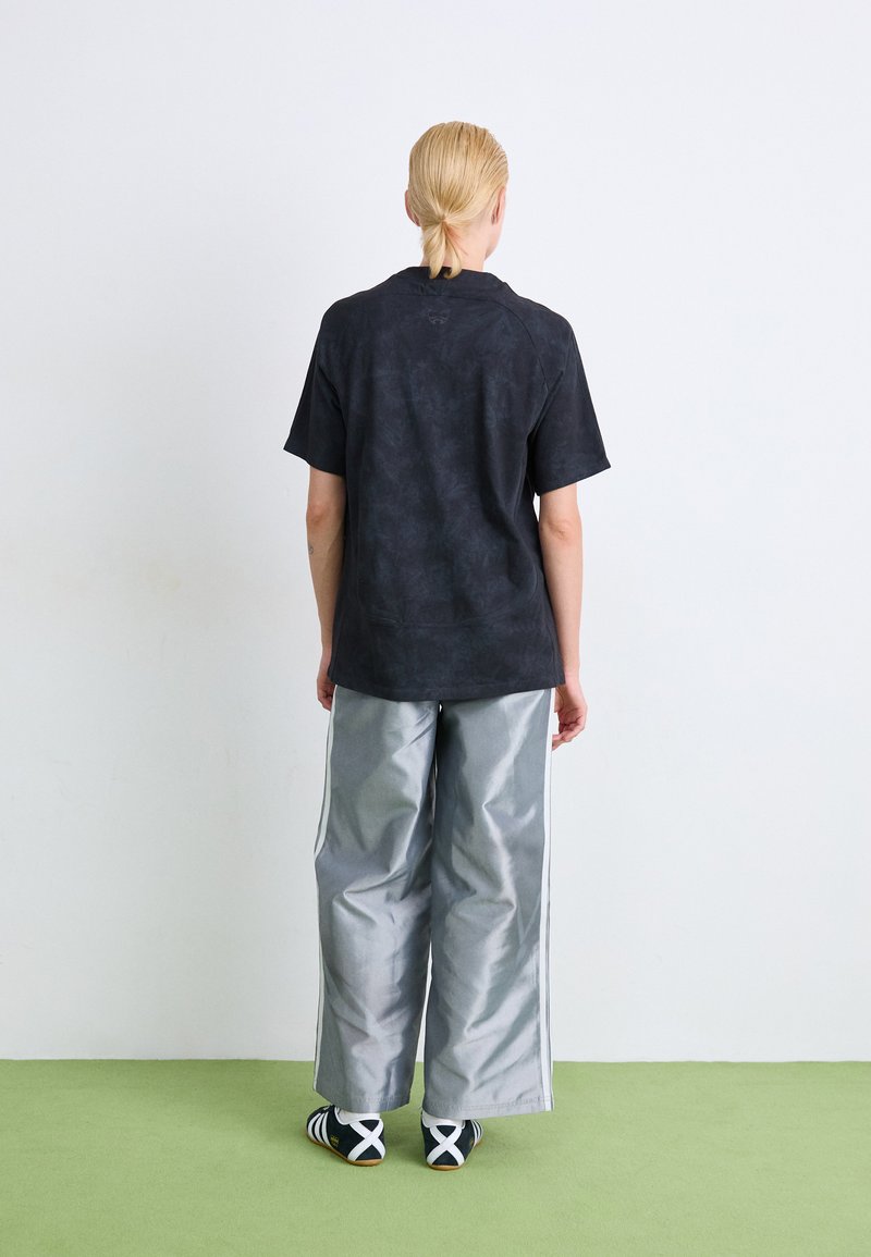 adidas Originals SHINE - Wide leg - light blue