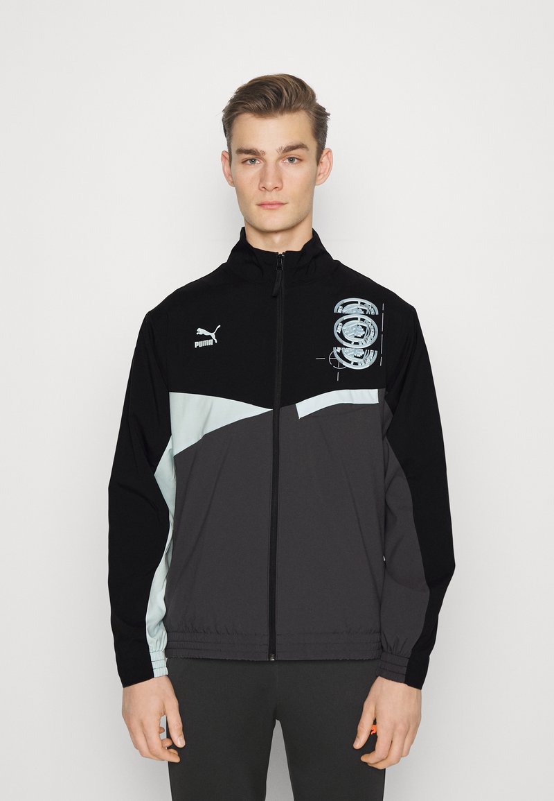 Puma MANCHESTER CITY FTBLSTATEMENT Club wear black/asphalt/black Zalando.de