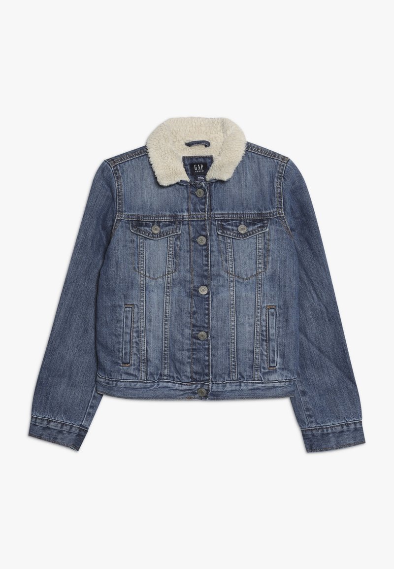 Džínová bunda světle modré barvy s krémovým umělým kožíškem na límci, zapínáním na knoflíky, dvěma náprsními kapsami a bočními kapsami. Klasický střih s efekty opotřebení.