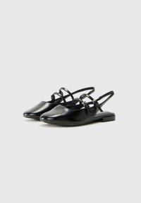 Black leather slingback shoes with a pointed toe, thin straps, and a low block heel. Smooth texture with minimal detailing.
