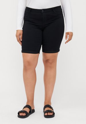 Black denim shorts with a fitted design, rolled cuffs, front pockets, and a button closure, paired with black sandals.