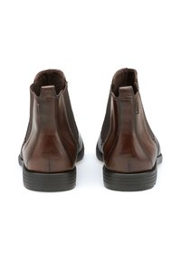 Braune Leder-Ankle-Boots mit elastischen seitlichen Einsätzen, glatter Oberfläche, runder Zehenpartie und gummierter Sohle mit leichtem Absatz.