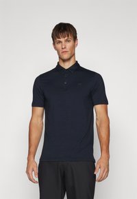 TravisMathew THE HEATER - Pólóing - black
