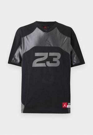 Fekete és szürke rövid ujjú sportmez 23-as szürke számmal az elején, valamint kis piros Jumpman logóval a szegély alján.