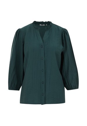 Blusa verde scuro con maniche a sbuffo, chiusura con bottoni e tessuto testurizzato. Presenta un colletto arricciato e una silhouette ampia.