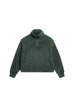 Pull noir en polaire avec un col haut, une patte de boutonnage à l'avant et deux poches latérales zippées. Texture douce et coupe décontractée.