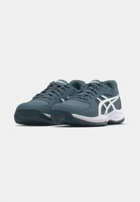 Gray athletic shoes with white accents, textured synthetic upper, lace-up design, and rubber outsole. Low-profile silhouette.