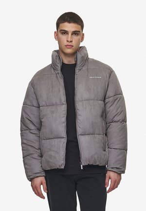 Gray padded jacket with a high collar and zip closure. Features a subtle texture and the brand name "PEGAADOR" printed on the chest.