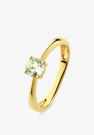Goldring mit einem runden, hellgrünen Edelstein, der in vier Krappen gefasst ist, und einem glatten, polierten Band.