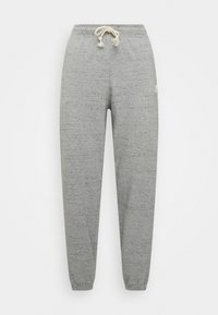 Grå sweatpants i ett texturerat tyg, med ett elastiskt midjeband och dragsnöre samt elastiska muddar vid anklarna. Litet logotypdetalj.