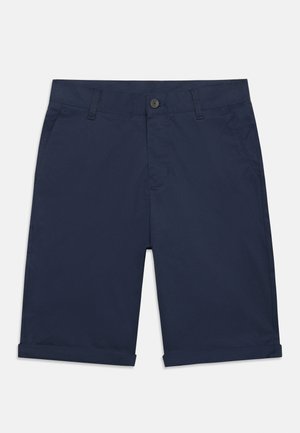 Granatowe krótkie spodenki do kolan z zapięciem na guzik i zamek błyskawiczny, bocznymi kieszeniami, szlufkami na pasek oraz podwiniętymi mankietami.