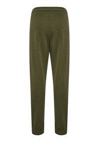 Olivgröna joggers i mjukt material; elastiskt midjeband; smalnande ben med ribbade manchetter; enkel, odekorerad design.