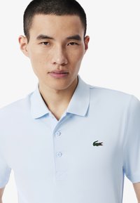 Lacoste Sport SHORT SLEEVES - Pikeepaita - bleu clair t