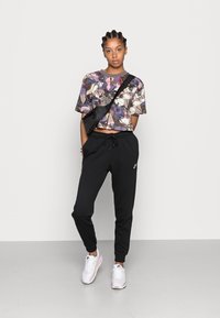 Nike Sportswear Treniņtērpa apakšdaļas - black/white