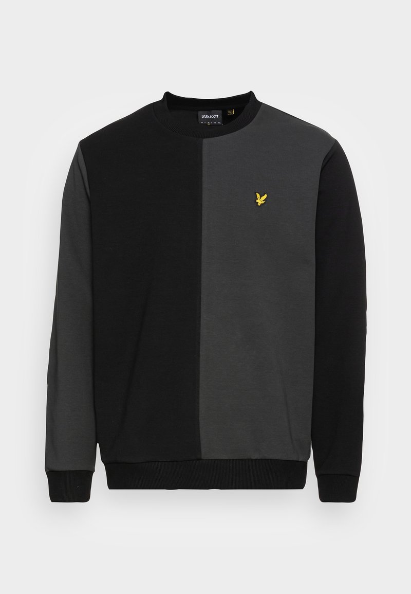 Sweat-shirt à manches longues col rond avec blocs de couleurs noirs et gris foncé verticaux, poignets côtelés et petit logo oiseau jaune sur la poitrine gauche.