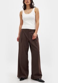Auduma bikses - brown
