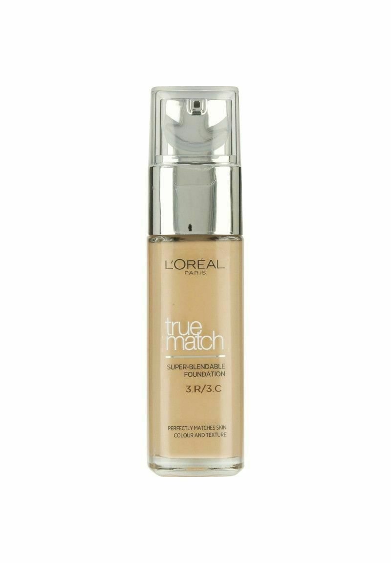 L'Oréal Paris True Match-foundation i en genomskinlig glasflaska med en silverpump. Ljusbeige färg, märkt 3.R/3.C, super-blendbar formel.
