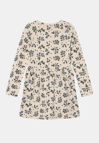 Abito a maniche lunghe realizzato in tessuto leggero, con uno sfondo crema e motivi floreali in verde, blu e rosa. Design con gonna svasata.