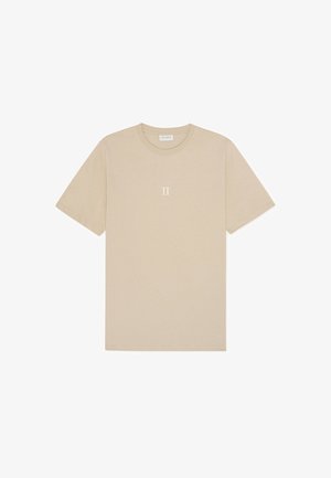 T-shirt de algodão bege com mangas curtas e decote redondo. Apresenta um pequeno gráfico "II" centrado numa tonalidade mais clara.