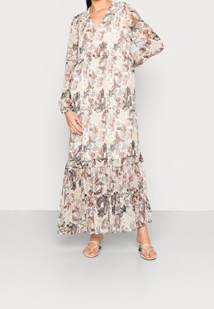 Vestido largo y fluido hecho de tela liviana y transparente con un patrón floral mixto que presenta tonalidades de rosa, beige y gris, con un dobladillo de capas.