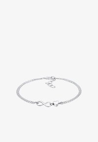 Seleccionado, silver-coloured