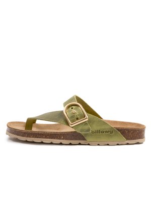 Sandale en cuir vert avec une boucle dorée, semelle en liège et semelle extérieure en caoutchouc texturé avec un bord festonné. Nom de la marque "billowy" affiché.