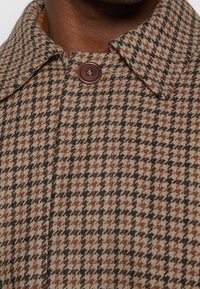 Nudie Jeans Klassisk kappa / rock - brown