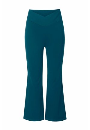 Pantaloni svasati color teal con una vita ampia. Realizzati in tessuto elasticizzato, con un design incrociato in vita e una texture liscia.