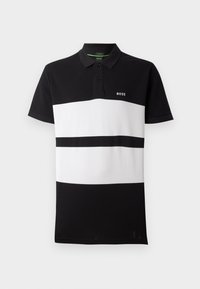 Svart-hvitt stripete polo skjorte laget av bomull, med en to-knappskrage og en liten brodert logo på brystet. Teksturt stoff.