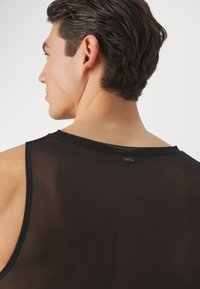 We Are We Wear TAURUS RAVER FRONT BODY - Undershirt - black