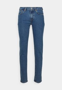 Mörkblå denimjeans med slim fit, femfickorsdesign, framknäppning och subtila sömnadsdetaljer på fickorna.