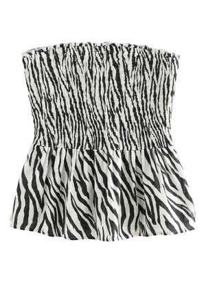 Top senza spalline con corpetto arricciato in stampa zebra bianca e nera, con orlo svasato e tessuto testurizzato.