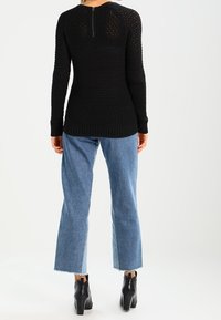 QS Sweter