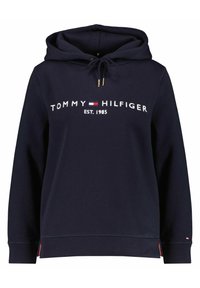 Navy hoodie made of soft fabric featuring a drawstring, front logo "TOMMY HILFIGER EST. 1985," and contrast hem detail with a small logo tag.