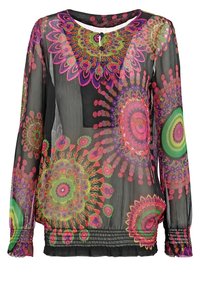 Blouse noire transparente à manches longues, ornée de motifs floraux vibrants en rose, vert et violet. Fermeture à boutons au niveau de l'encolure, poignets froncés.