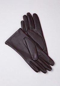 Brown leather gloves with a smooth texture, featuring three distinct fingers and a longer wrist cuff design. Red stitching detail visible.
